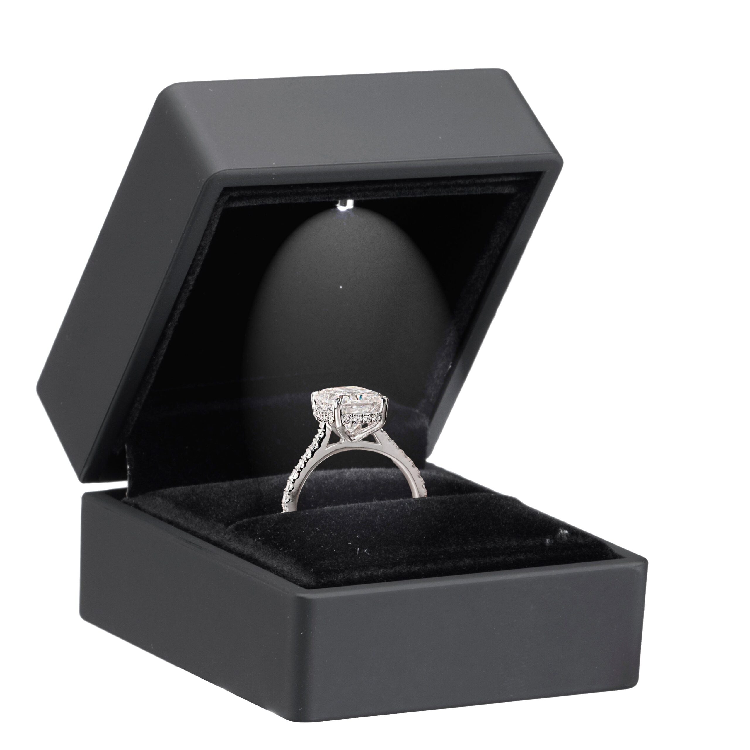 Black LED ring box with integrated display lighting, custom logo branding, and microfiber ring holder insert