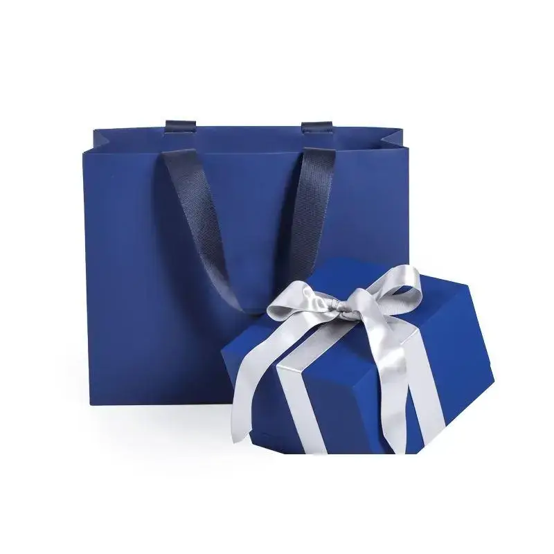 Custom luxury blue rigid paper jewelry boxes with branded foil-stamped logo and velvet insert, wholesale OEM