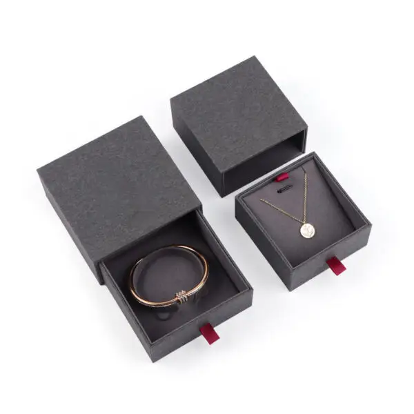 Custom Cardboard Drawer Ring Boxes | Wholesale Jewelry Packaging Custom cardboard drawer ring boxes with embossed logo and velvet interior, wholesale jewelry packaging