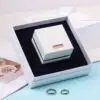Premium double ring presentation box with two-piece display system, custom branding, and protective foam insert