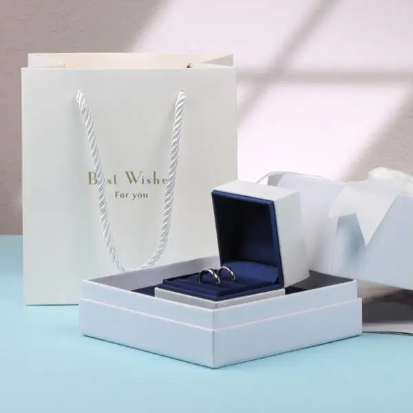 Premium double ring presentation box with two-piece display system, custom branding, and protective foam insert