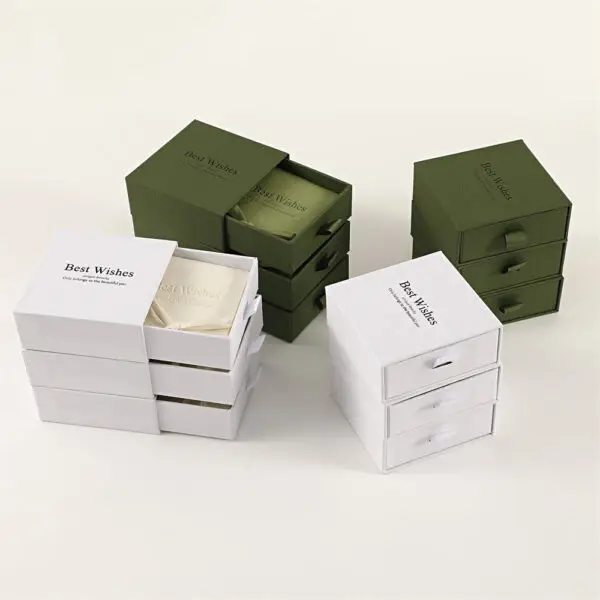 Custom Drawer Boxes with Personalized Microfiber Jewelry Pouches Custom drawer boxes with matching microfiber jewelry pouches for luxury unboxing and retail gift packaging