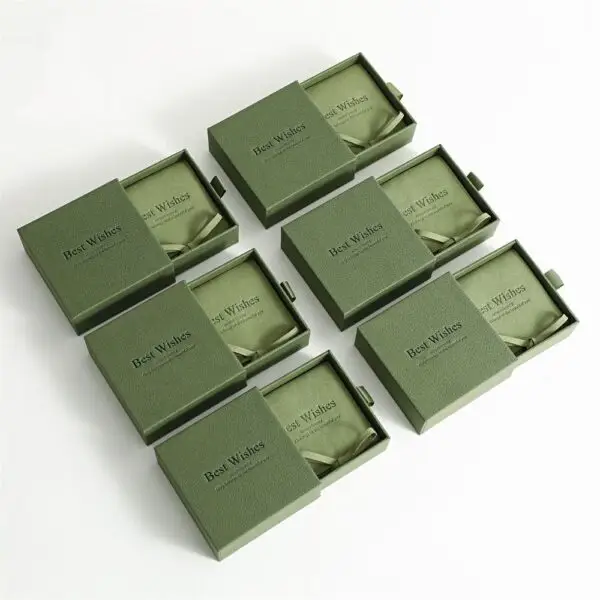 Custom Drawer Boxes with Personalized Microfiber Jewelry Pouches Custom drawer boxes with matching microfiber jewelry pouches for luxury unboxing and retail gift packaging
