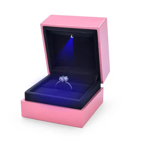 Custom Engagement Ring Box with LED Light & Logo Branding Custom luxury engagement ring box with integrated LED light, embossed logo branding, and velvet-lined insert display