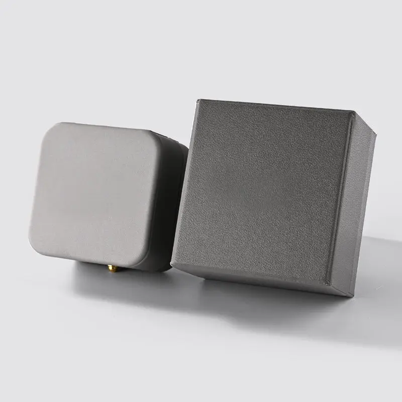Luxury grey leather engagement ring box — top-down view with soft velvet lining and personalization options visible