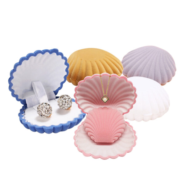 Flocked velvet crown-shaped mini jewelry box with seashell design detail, wholesale custom packaging