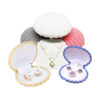 Flocked velvet crown-shaped mini jewelry box with seashell design detail, wholesale custom packaging