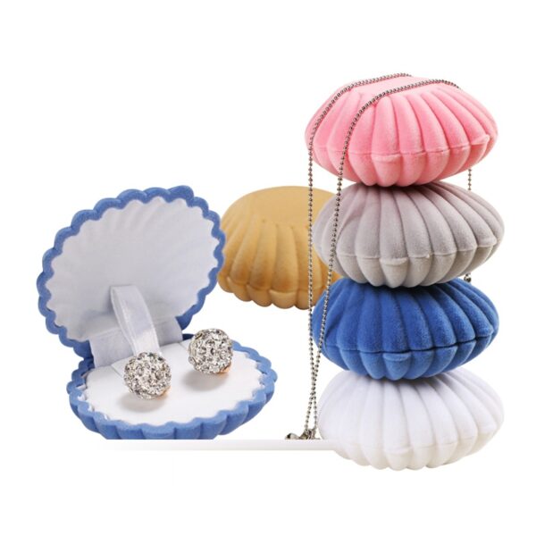 Flocked velvet crown-shaped mini jewelry box with seashell design detail, wholesale custom packaging