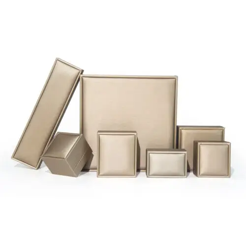 Custom Gold Leather Ring Box – Private Label Jewelry Packaging Gold foil custom leather ring box with soft suede interior lining and hinged lid for retail jewelry packaging