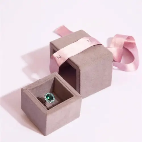 Luxury custom jewelry display boxes in various colors and finishes with custom branding and insert options