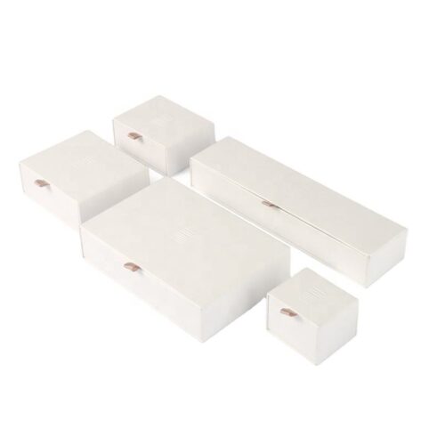 Custom white kraft paper jewelry drawer box with embossed logo and custom EVA foam insert for premium jewelry packaging