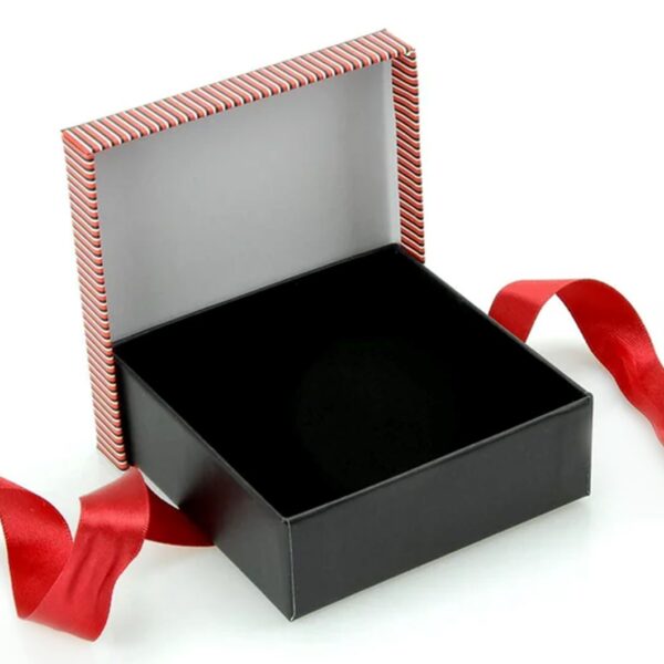Custom striped bow rigid gift jewelry box with adjustable foam insert, shown with branded lid and interior layout