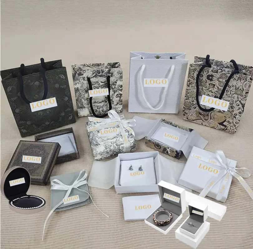 Custom branded rigid paper jewelry gift boxes with velvet interior and gold foil logo — factory-direct wholesale