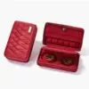 Premium custom velvet jewelry travel pouches with embroidered logo in burgundy and navy