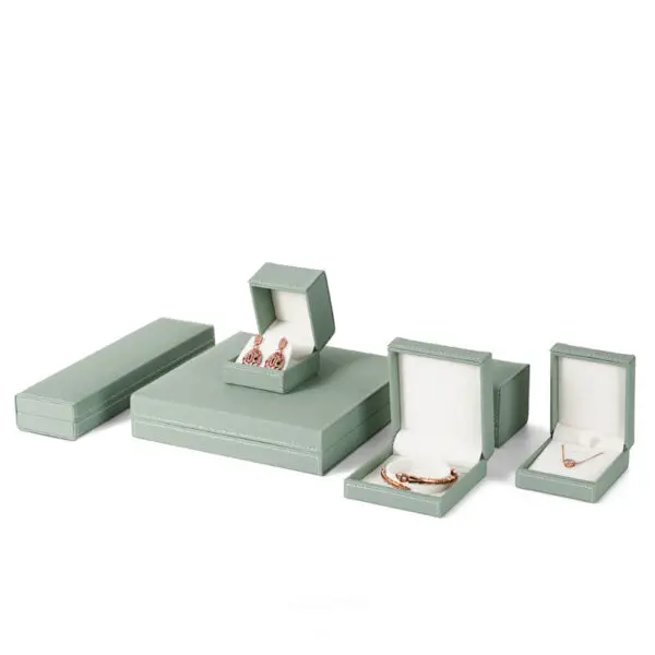 Custom Light Green Leather Earring Boxes – Wholesale Jewelry Packaging Premium custom light green leather earring boxes with foam inserts and branded logo