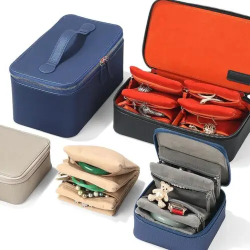 Premium custom leather travel jewelry box with soft velvet pockets and multi-compartment storage for jewelry organization