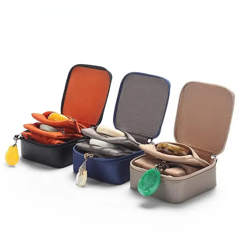 Premium custom leather travel jewelry box with soft velvet pockets and multi-compartment storage for jewelry organization