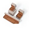 Premium gray leather flip-top jewelry box with custom logo branding, luxury retail packaging