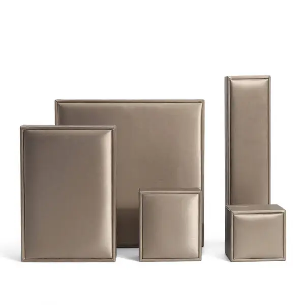 Brushed leather jewelry box with custom embossed logo, premium interior lining, and customizable compartments for ring and pendant storage