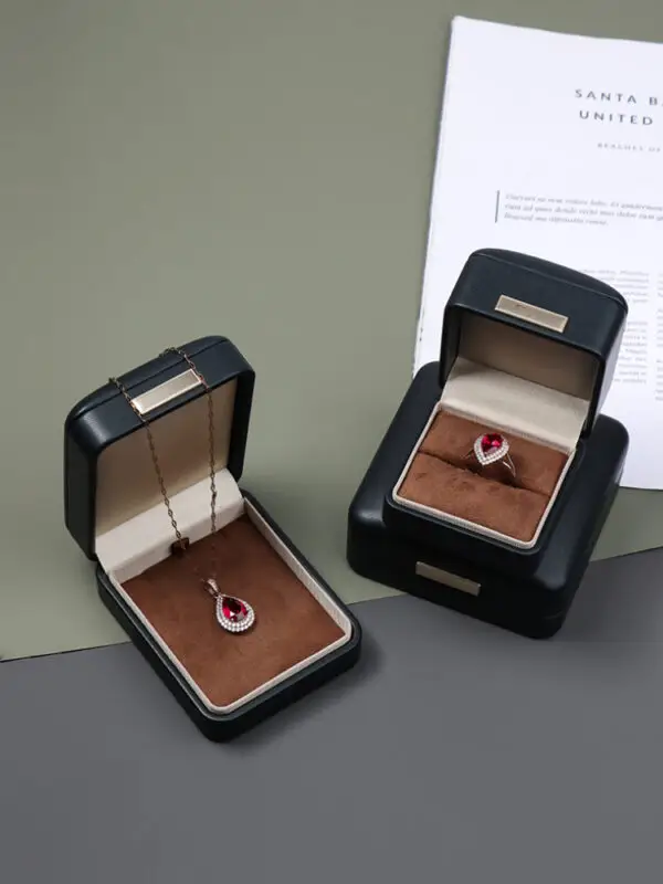 Premium leather jewelry box with custom embossed logo, luxury packaging for jewelry retailers and boutiques