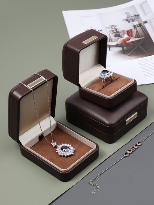 Premium leather jewelry box with custom embossed logo, luxury packaging for jewelry retailers and boutiques