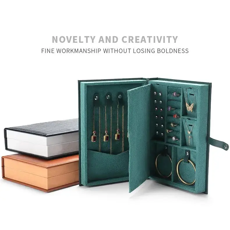 Custom leather book-style jewelry storage box with embossed logo and interior compartments for travel jewelry storage