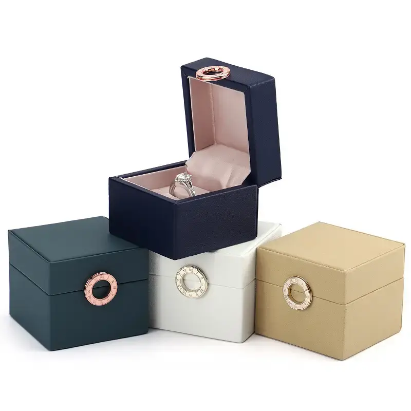 Premium custom leather ring box with embossed logo, magnetic closure, and velvet interior insert
