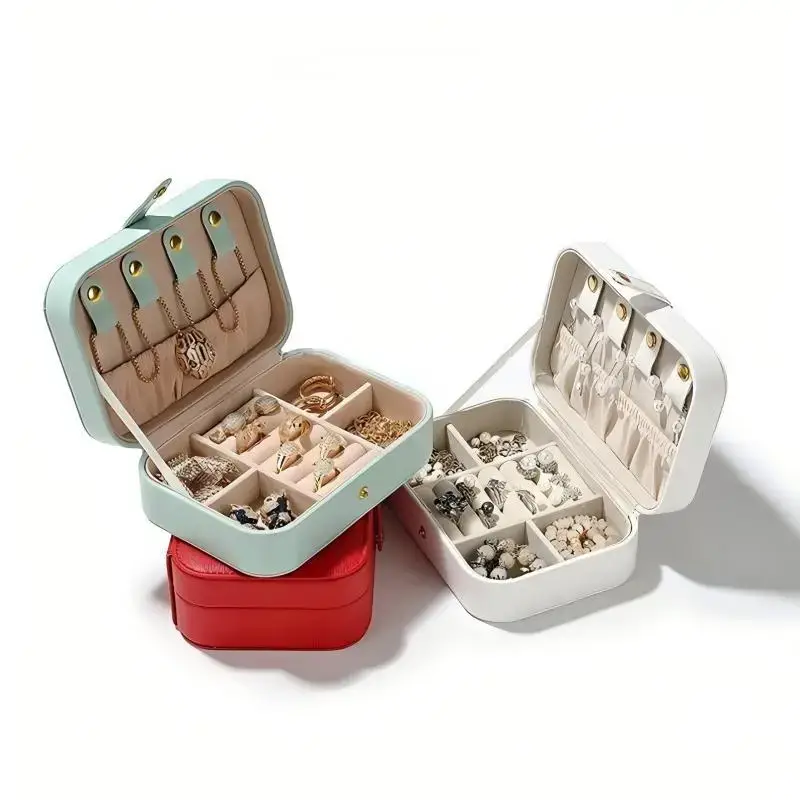 Textured leather travel jewelry case with custom branding, foam inserts, and professional hardware closure