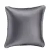 Custom Leatherette Bracelet Pillow Display with Stand – Private Label Custom leatherette bracelet pillow display with integrated adjustable stand, featuring embroidered logo and premium finish