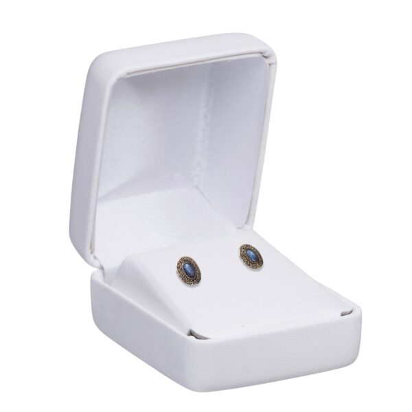 Custom leatherette rounded earring box with luxury finishes for jewelry brand packaging
