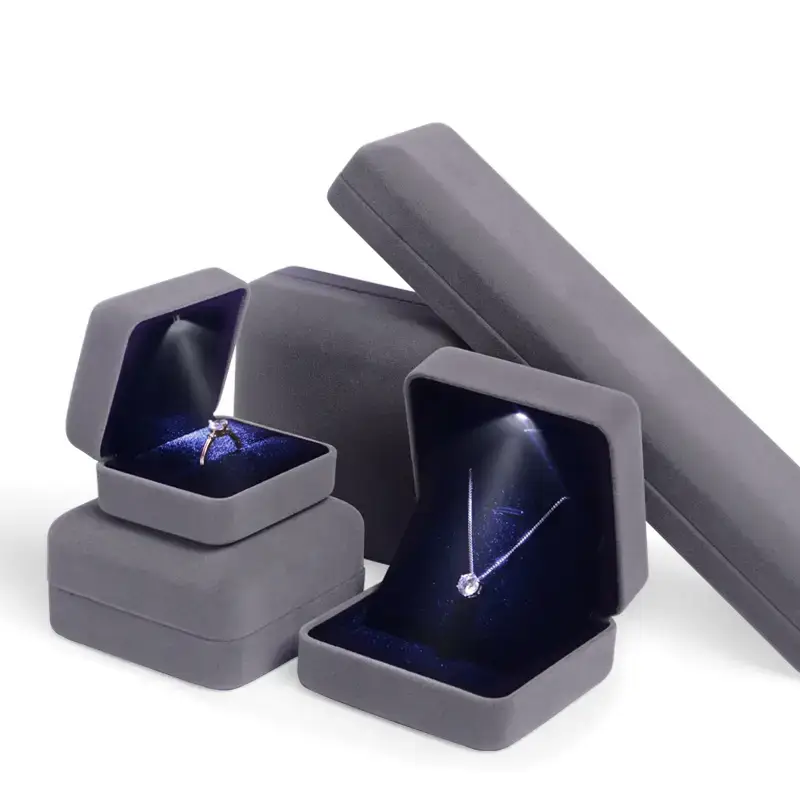 Premium custom LED light earring box with luxury flocking finish and professional jewelry display compartments