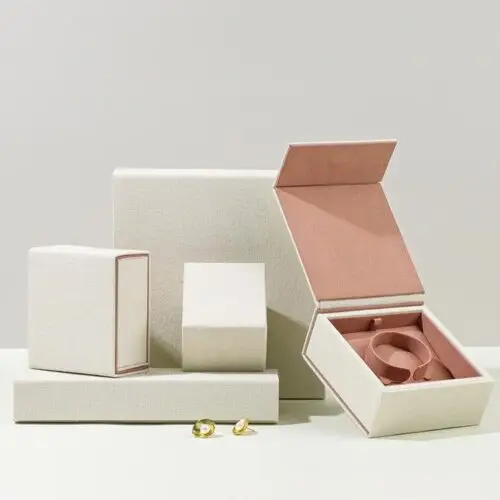 Custom luxury beige linen cotton rigid jewelry boxes with gold foil logo branding — OEM wholesale by On The Way Packaging