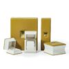 Luxury rigid jewelry box with ornate Middle Eastern-inspired design in deep jewel tones with gold accents, custom branded