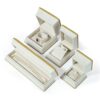 Luxury rigid jewelry box with ornate Middle Eastern-inspired design in deep jewel tones with gold accents, custom branded