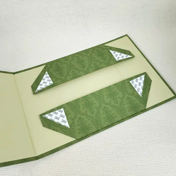 Premium custom luxury paper jewelry box with matching fabric pouch, hot-stamped logo, and coordinated branding.