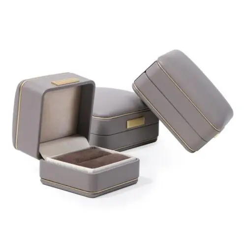 Custom luxury gray leather jewelry boxes with velvet insert and embossed logo, OEM wholesale packaging by On The Way