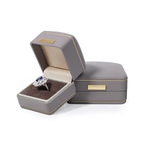 Custom luxury gray leather jewelry boxes with velvet insert and embossed logo, OEM wholesale packaging by On The Way
