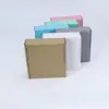 Custom magnetic closure rigid gift box with satin ribbon lift in matte black and gold foil stamped logo for jewelry brand packaging