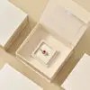 Custom polychrome magnetic jewelry gift box with branded logo and interior foam insert, factory-direct OEM packaging