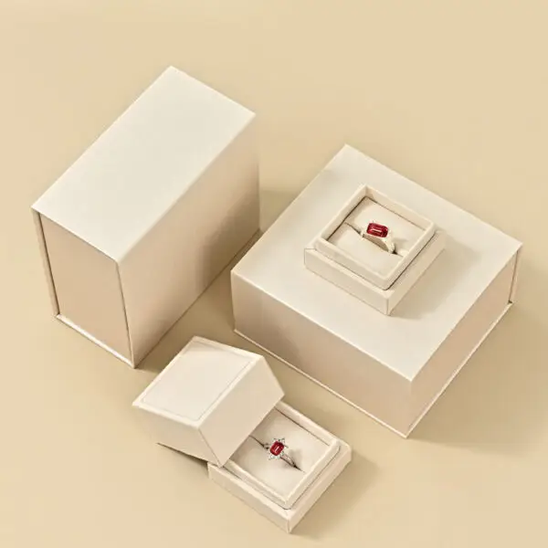 Custom polychrome magnetic jewelry gift box with branded logo and interior foam insert, factory-direct OEM packaging