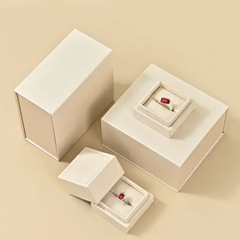 Custom polychrome magnetic rigid jewelry gift box with concealed closure and velvet lining for branded presentation