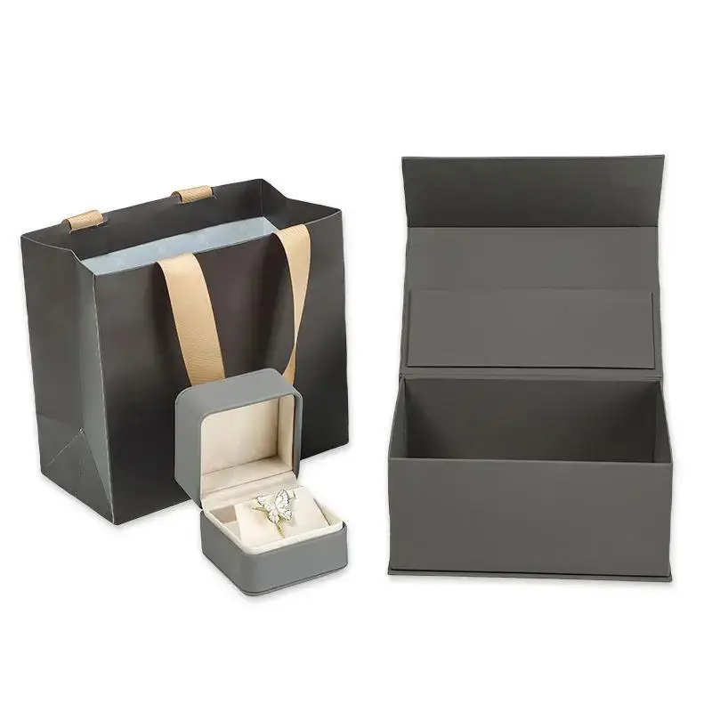 Luxury magnetic ring gift box with interior foam insert and secure closure for jewelry packaging