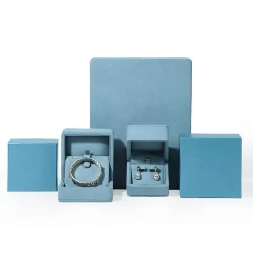 Premium blue microfiber earring and ring box with custom logo branding and felt insert compartments