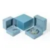 Premium blue microfiber earring and ring box with custom logo branding and felt insert compartments