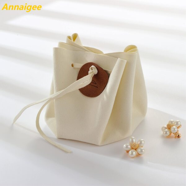 Custom Microfiber Jewelry Pouches – OEM & Private Label Bulk Microfiber jewelry pouches with custom logo embroidery, drawstring closure, and luxury branding