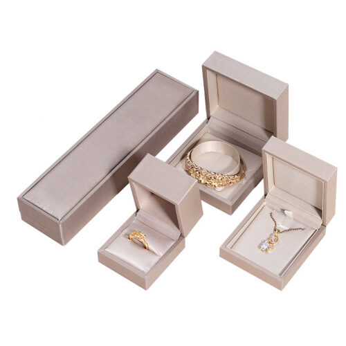 Custom PU leather earring box with velvet insert and personalized logo branding for retail jewelry packaging