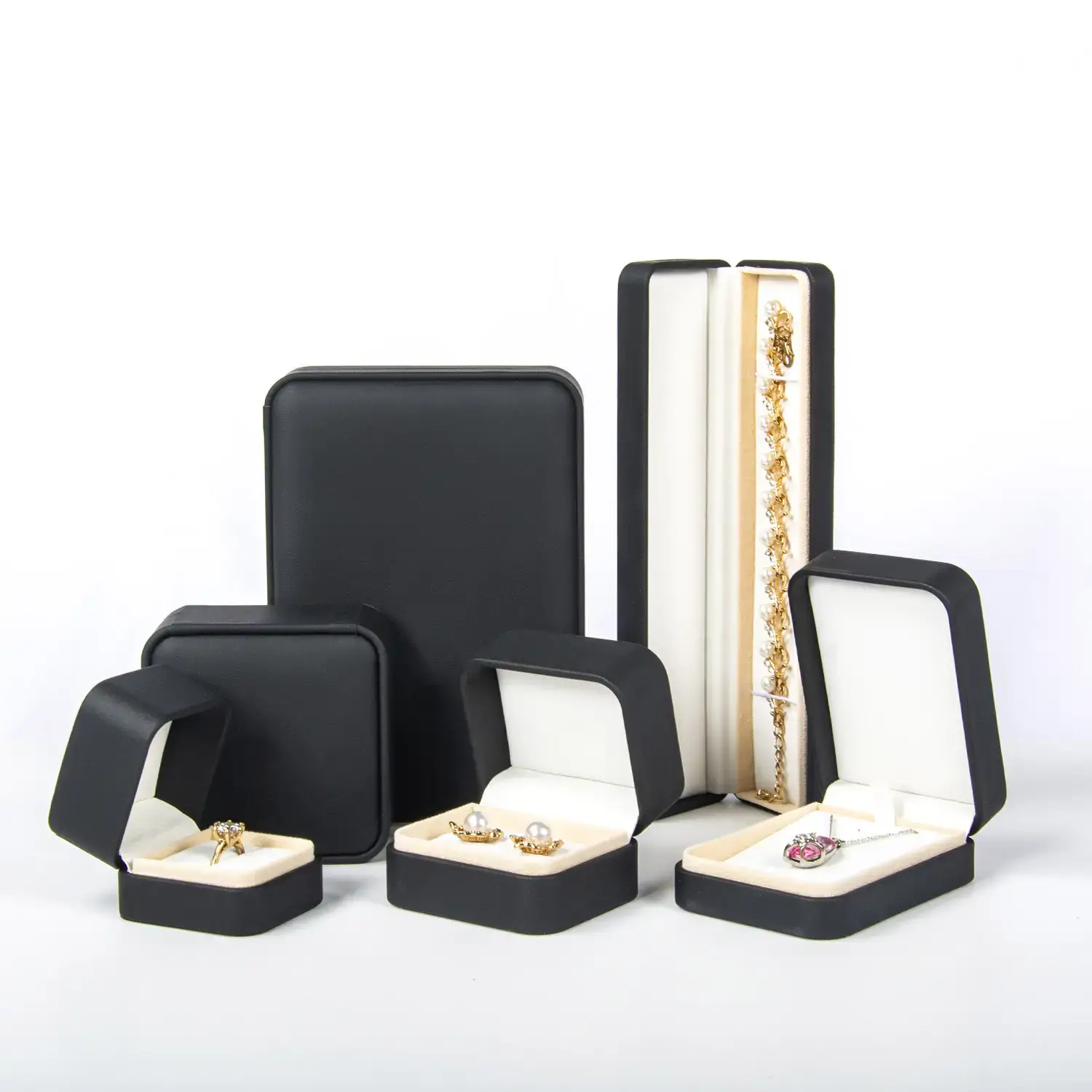 Custom PU leather jewelry packaging box with hot stamp logo, velvet insert, and magnetic closure — factory-direct OEM