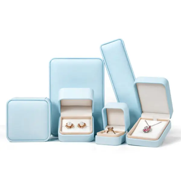 Premium PU leather jewelry box with custom logo embossing, foam insert, and luxury gift packaging design