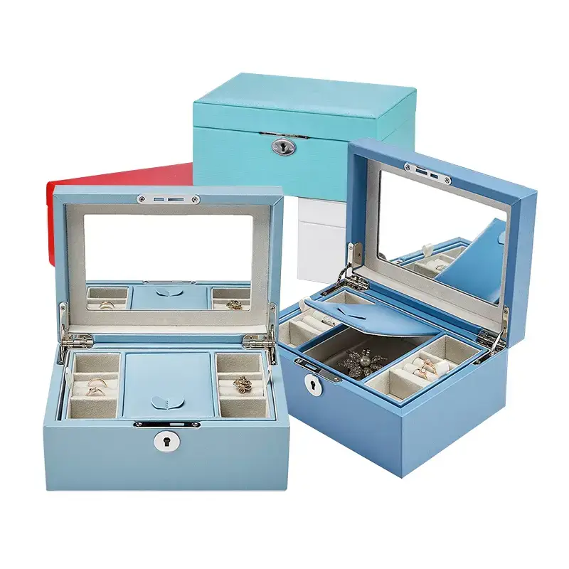 Lockable dual-layer PU leather travel jewelry case open showing velvet compartments for rings, necklaces and earrings