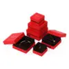 Classic red rigid two-piece jewelry boxes with custom logo branding and foam inserts